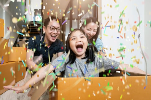 happiness-asian-family-mom-dad-daughter-moving-new-house-hand-carry-box-stuff-with-exited-fun-cheerful-expression