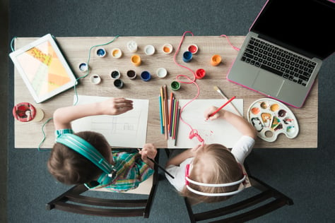 top-view-kids-with-watercolor-computer